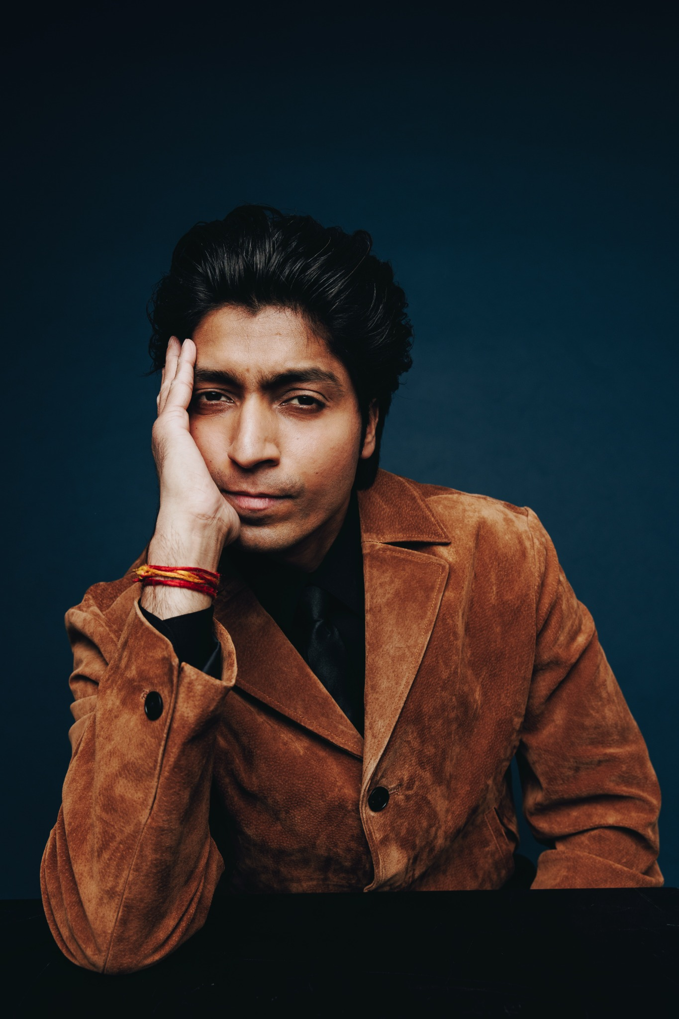 Harsh Kumar Shakti in a quiet, contemplative character portrait